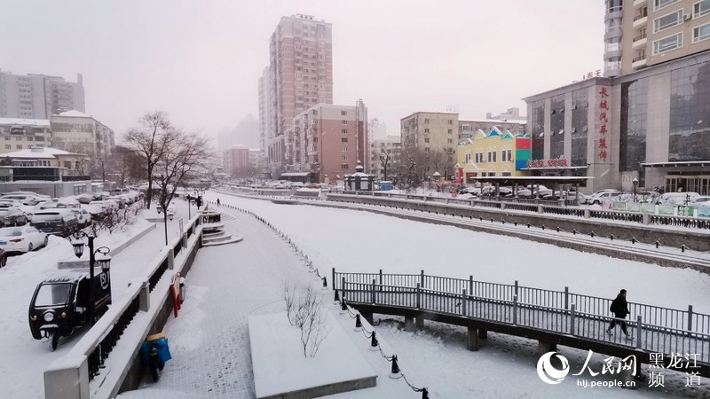 哈爾濱飄落2020年首場降雪 雪后降溫